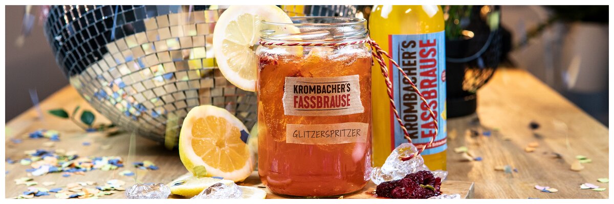Cocktail mit Fassbrause Mango und text: Glitzerspritzer
