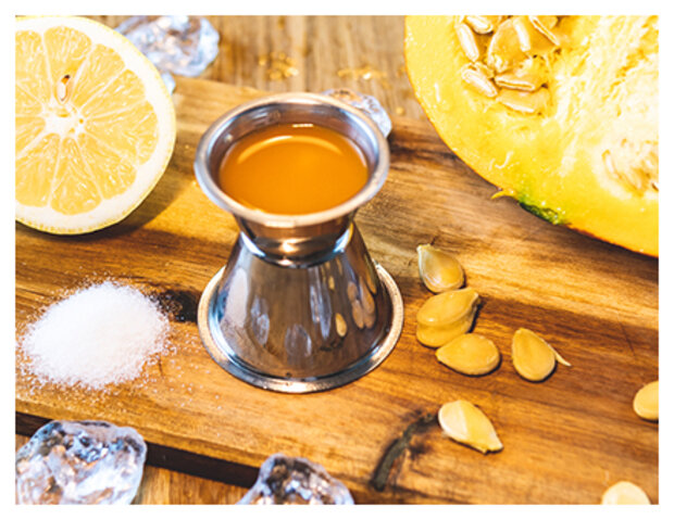 Kürbissaft in Behälter