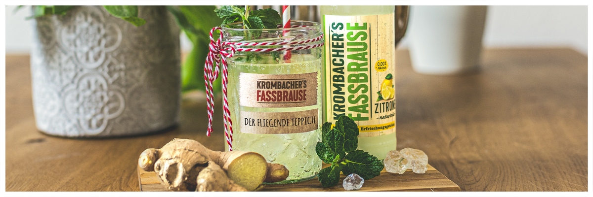 Cocktail mit Fassbrause Zitrone naturtrüb mit Ingwer und Minze mit Text: der fliegende Teppich