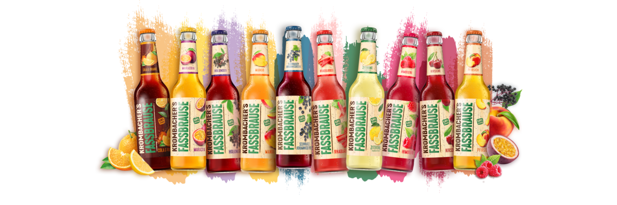 Alle Sorten von Krombacher's Fassbrause nebeneinander mit verschiedenen Fruchtabbildungen. 