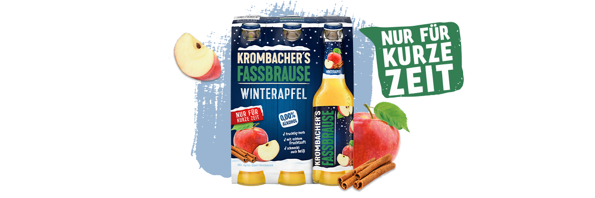 0,33l Flaschen Krombachers Fassbrause Winterapfel im blauen Sixpack , daneben ein roter Apfel und Zimtstangen und der Hinweis: Nur für Kurze zeit.